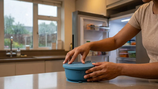 Indian parent sealing Cubkins silicone suction bowl lid for safe baby food storage before monsoon refrigeration