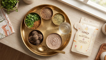 Indian galactagogue foods like methi and halim laddoos with a Cubkins milk storage bag