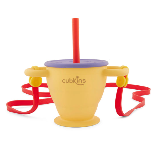 Mango Cubkins 2-in-1 silicone sipper and snack cup with blue lid, red straw, and red carry strap.