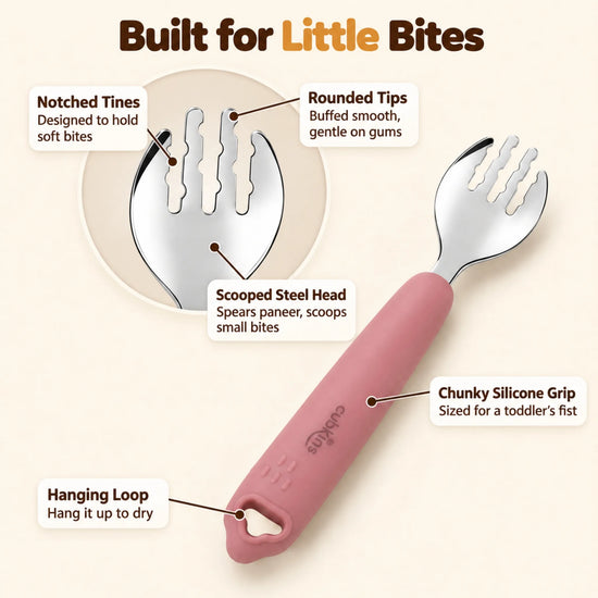 Cubkins raspberry toddler fork with callouts for rounded tines, scooped steel head, chunky silicone grip and hanging loop
