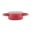 Cubkins cherry red silicone snack cup in its fully collapsed state, highlighting its space-saving and portable design.