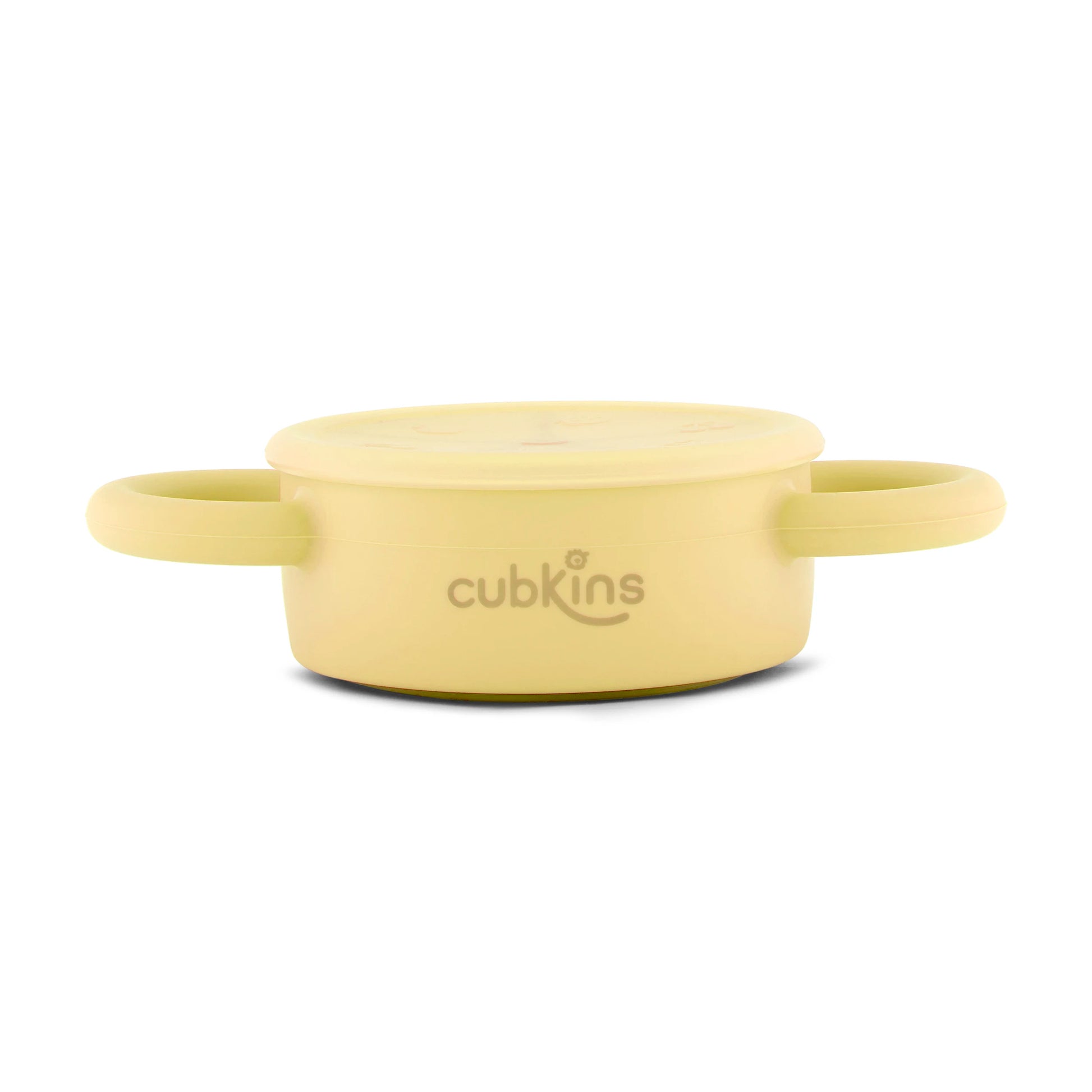 Cubkins lemon yellow silicone snack cup in its fully collapsed state, highlighting its space-saving and portable design.