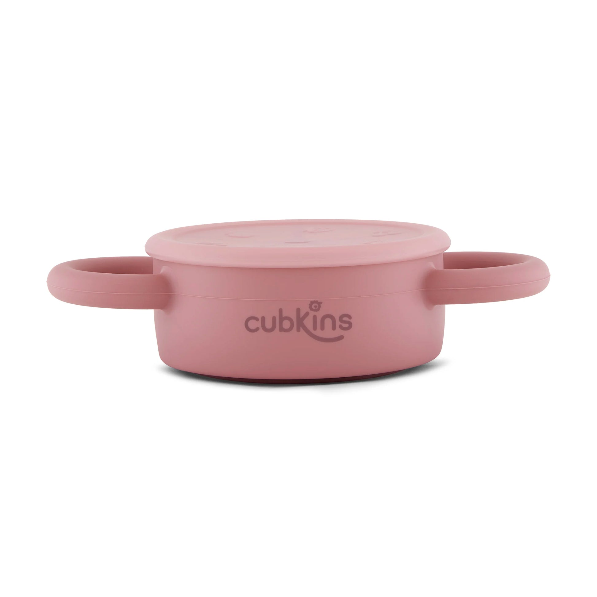 Cubkins raspberry pink silicone snack cup in its fully collapsed state, highlighting its space-saving and portable design.