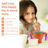 Young girl using the Cubkins Sip-N-Snack cup with its suction base and soft straw for a mess-free healthy snack time