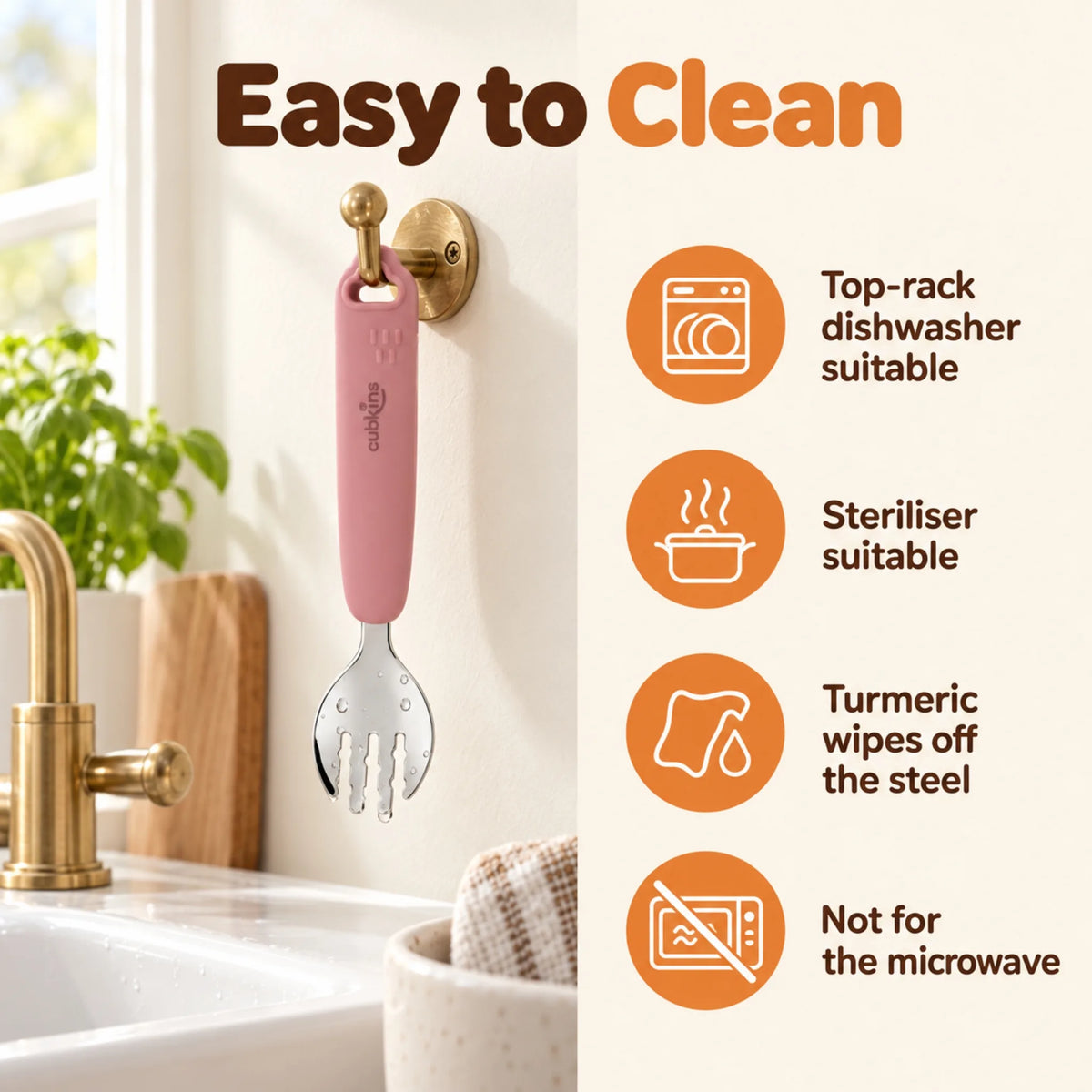 Cubkins raspberry steel toddler fork hanging to dry by its loop, with care icons: top-rack dishwasher, steriliser, turmeric wipes off, not for microwave