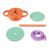 Set includes Tangerine silicone cup, two interchangeable lids, a matching straw, and a flexible purple carry strap.