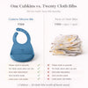 Comparison infographic showing Cubkins blue silicone bib at 324 rupees versus pack of cloth bibs at 300 rupees repeated, highlighting wipe-clean, stain-resistant, zero laundry benefits