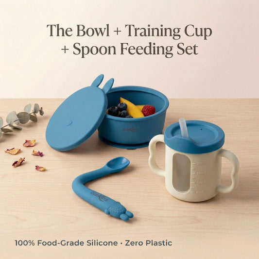 Cubkins 3-piece baby feeding set in Blue Olive — silicone suction bowl with bunny-ear lid, 3-in-1 training cup with straw, and bendable spoon. 100% food-grade silicone, zero plastic.