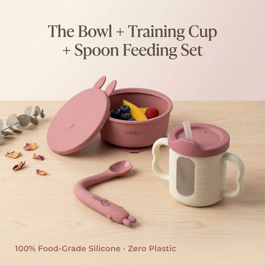Cubkins 3-piece baby feeding set in Raspberry — silicone suction bowl with bunny-ear lid, 3-in-1 training cup with straw, and bendable spoon. 100% food-grade silicone, zero plastic.