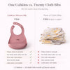 Cost and benefit comparison chart of Cubkins raspberry silicone bib versus cloth bibs showing no haldi stains, zero odor absorption, and durability advantages