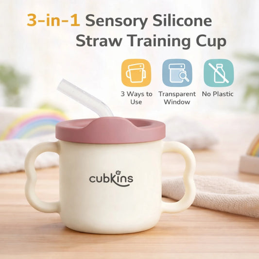Cubkins 3-in-1 Sensory Silicone Straw Training Cup in raspberry pink with dual handles, silicone straw, and icons highlighting 3 ways to use, transparent window, and no plastic