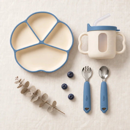 Cubkins plate, cup, spoon and fork set in Blue Olive: silicone suction plate, sensory straw training cup and 304 steel spoon and fork with silicone handles, top-down on linen