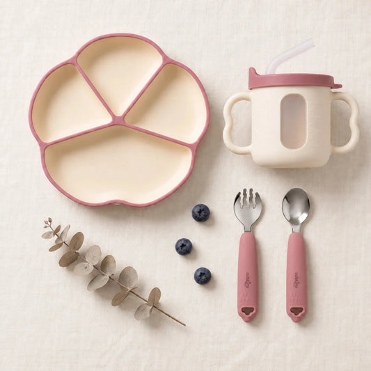 Cubkins plate, cup, spoon and fork set in Raspberry: silicone suction plate, sensory straw training cup and 304 steel spoon and fork with silicone handles, top-down on linen