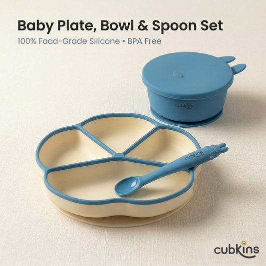 Cubkins 3-piece silicone baby feeding set in Blue Olive — 4-compartment suction thali plate, suction bowl with bunny-ear lid, and bendable spoon on a neutral background