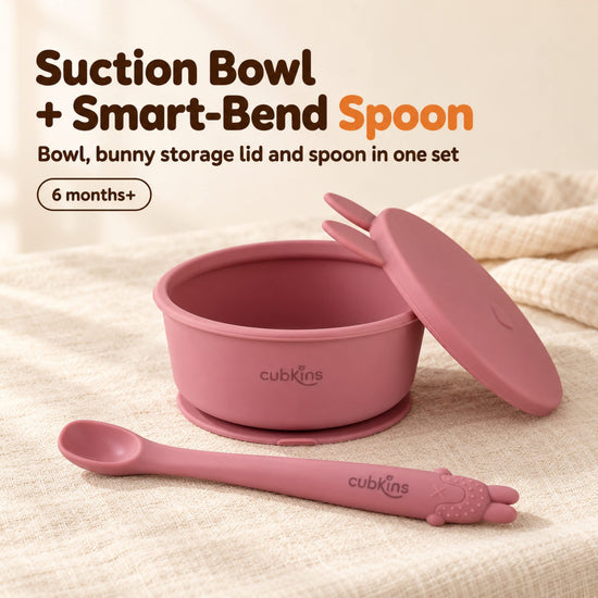 Cubkins starter set in Raspberry: silicone suction bowl with its bunny storage lid leaning against it and the Smart-Bend bendable spoon, for 6 months+