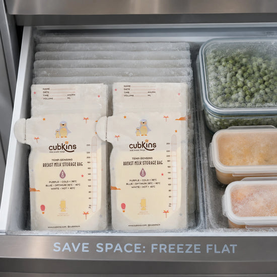 Cubkins breast milk bags frozen flat in freezer drawer for space-saving storage