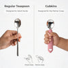 Side-by-side comparison of a regular teaspoon and the Cubkins raspberry spoon showing the palmar grasp design for toddlers