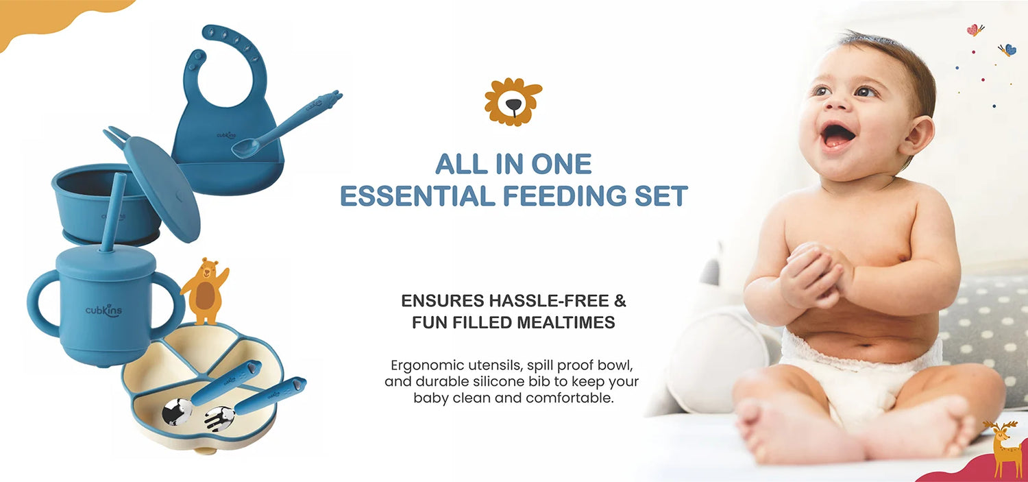 Cubkins All-in-One Essential Feeding Set featuring a silicone bib, suction bowl, divided plate, and ergonomic utensils.