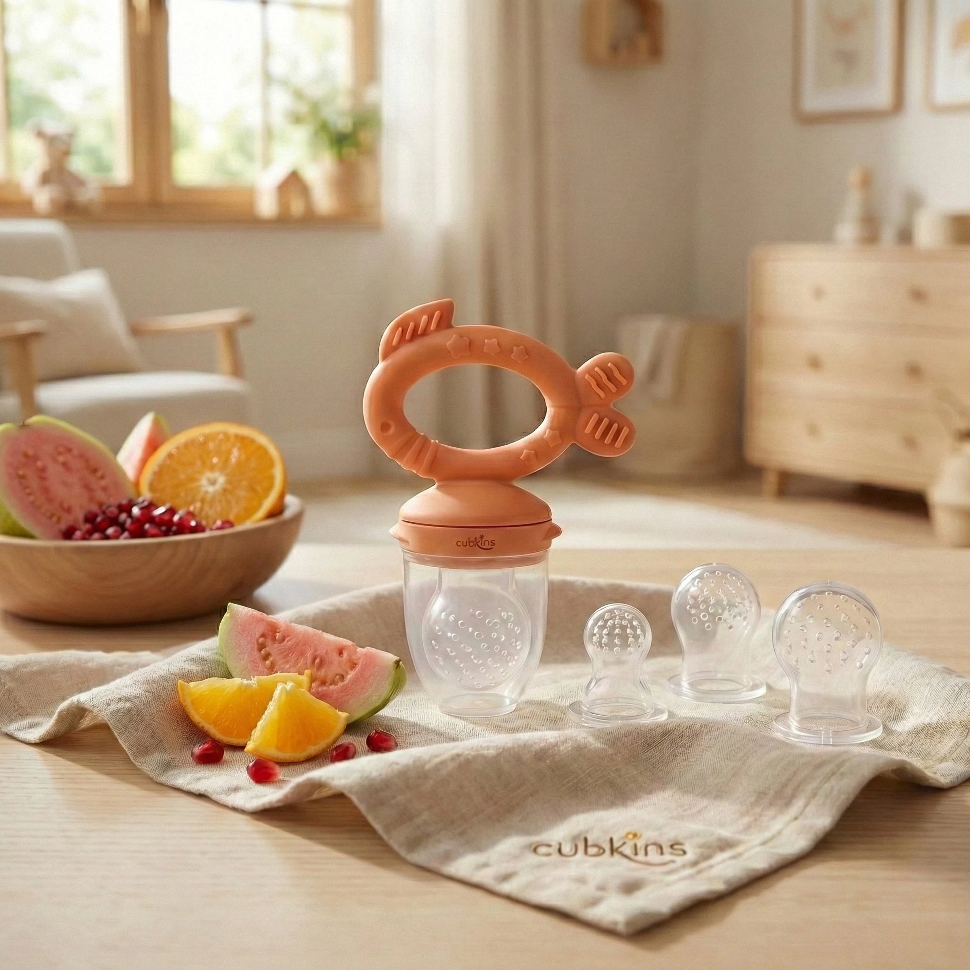 Cubkins 100% silicone baby fruit feeder and teether in orange with 3 interchangeable sacs and fresh fruit – BIS certified, zero plastic
