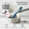 Cubkins blue silicone baby spoon being lifted out of boiling water with tongs, showing 200°C heat resistance; icons below confirm boil safe, steam sterilizer, and dishwasher safe