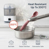 Cubkins raspberry silicone baby spoon being lifted out of boiling water with tongs, showing 200°C heat resistance; icons below confirm boil safe, steam sterilizer, and dishwasher safe.