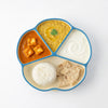 Cubkins blue silicone suction plate filled with paneer curry, dal, curd, rice and roti — Indian thali-style baby meal