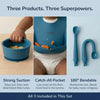 Cubkins blue silicone set features: suction bowl stays put, catch-all bib pocket, 180-degree bendable spoon with reinforced core