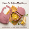 Cubkins raspberry silicone bowl filled with khichdi and ghee — designed for Indian baby foods like dal, ragi, banana and curd rice